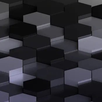 Close-up of a textured surface with a pattern of hexagonal, gray, and black blocks.